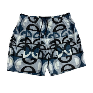 Dolce & Gabbana Blue/white abstract "DG" geometric print Swim shorts, 8 years