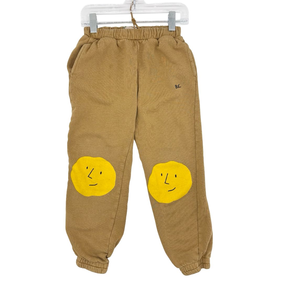 Bobo Choses mustard sweatpants w/yellow face, 6-7 years